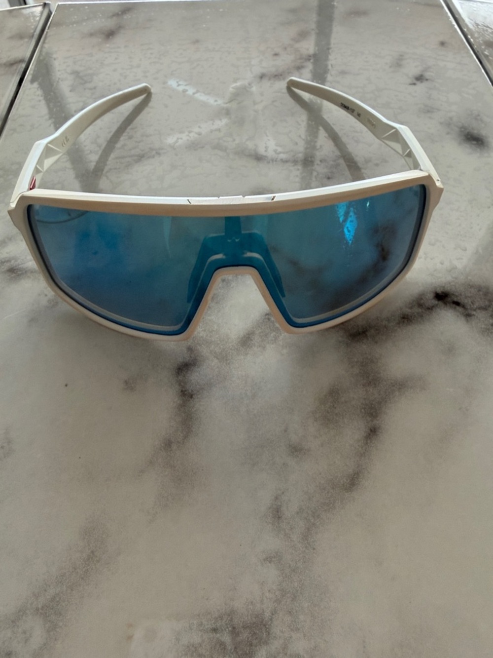 Oakley White Frame Sunglasses with Blue Mirrored Lens